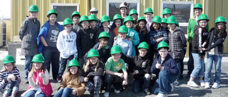 Kids wearing safety hard hats