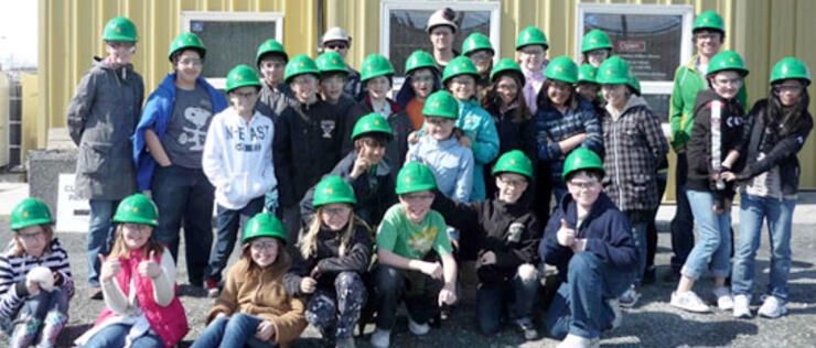Kids wearing safety hard hats